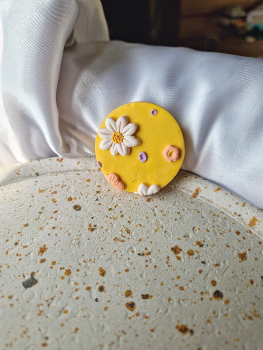 Magnet rond jaune.