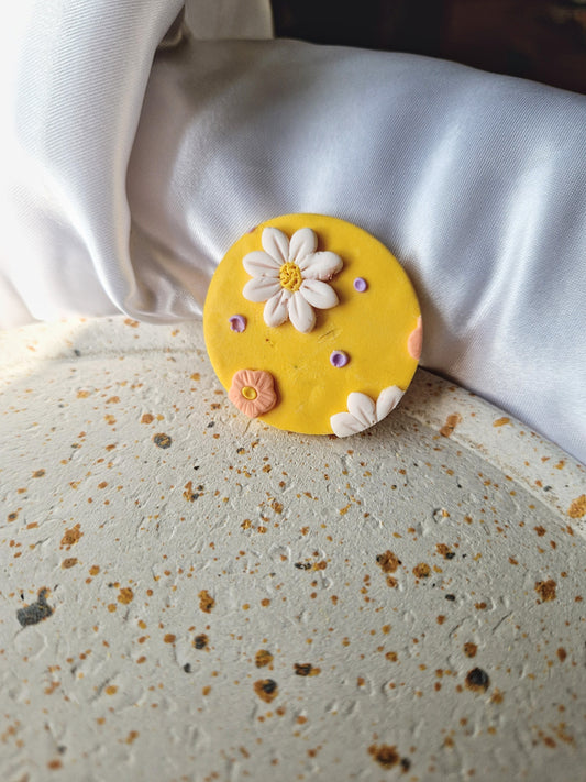 Magnet rond jaune.