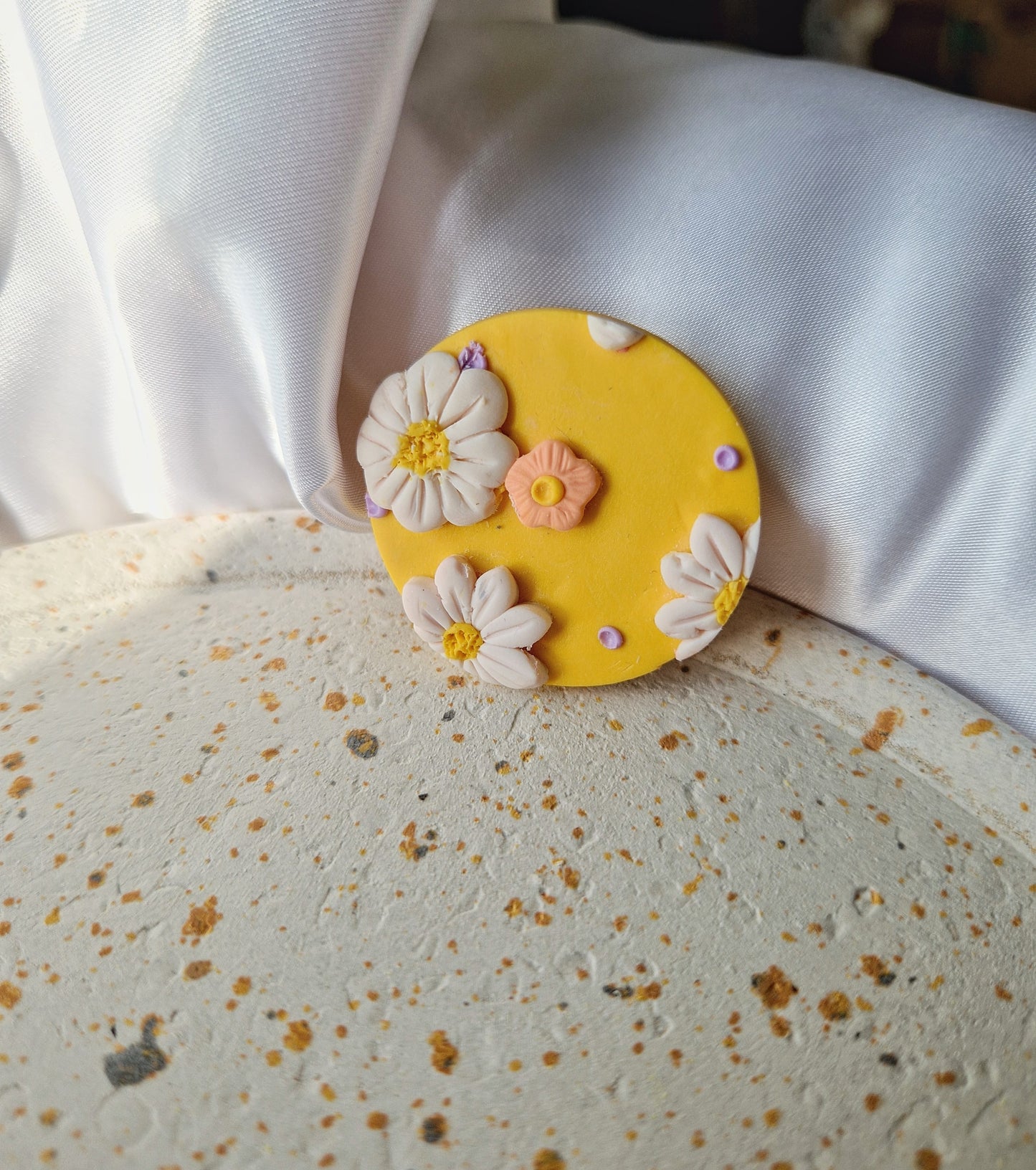Magnet rond jaune.