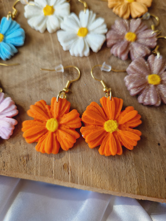 Boucles fleurs orange.