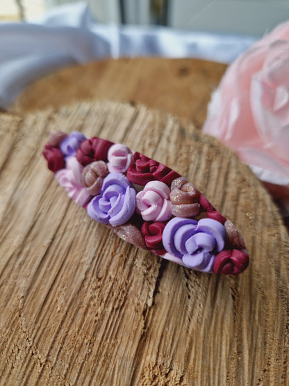 Barrette roses.