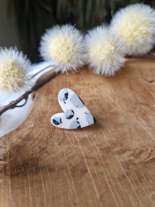 Pin's léopard blanc argent 🐆.